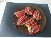 Una foto de pincho de anchoa y pimiento