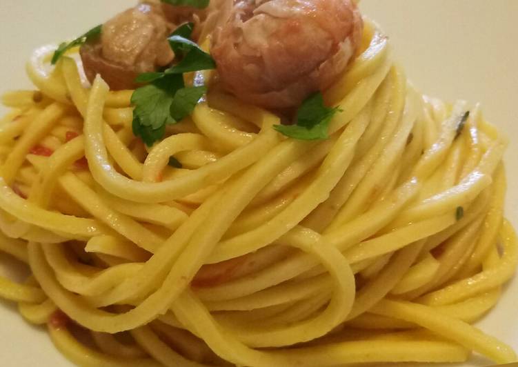 Steps to Make Homemade Spaghetti chitarra al sugo di scampi