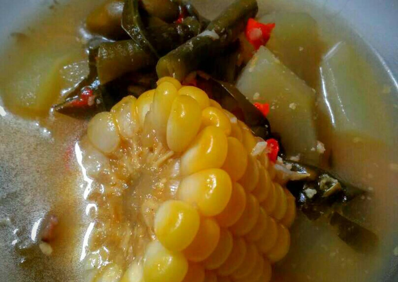 Asam dengan sayuran dan rempah-rempah