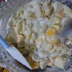 A picture of Macaroni in fruits with yoghurt.