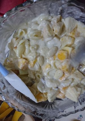 A picture of Macaroni in fruits with yoghurt.