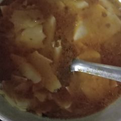 A picture of Papad in gravy.