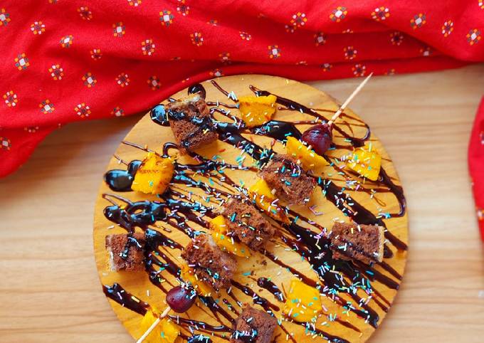 Chocolate cake and fruit skewer