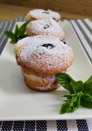 Una foto de Muffins de arándanos y queso