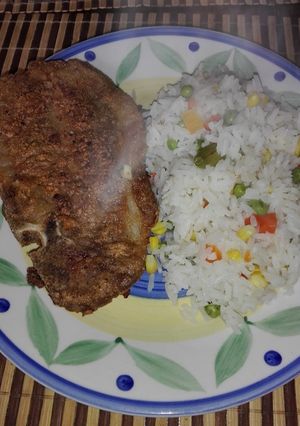 Una foto de Chuleta de Cerdo con Harina Tostada