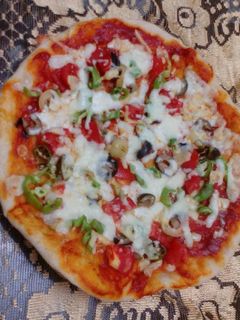 صورة لوصفة بيتزا 🍕