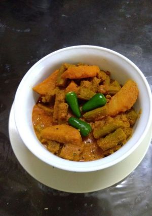 A picture of Drumstick poppy seeds curry (Data posto).