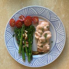 A picture of Garlic fry stirred veggies and Grilled Salmon with Prawn Cocktail.