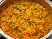 Una foto de arroz a la milanesa