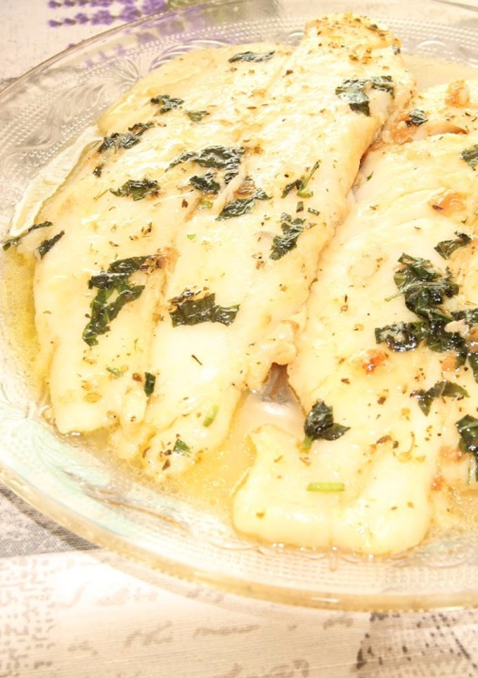 Una foto de Filete de merluza al ajillo