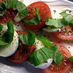 A picture of Tomato, mozzarella and fresh basil Salad.