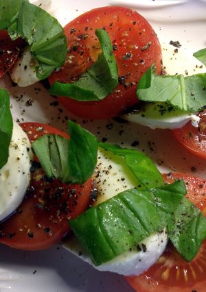 A picture of Tomato, mozzarella and fresh basil Salad.