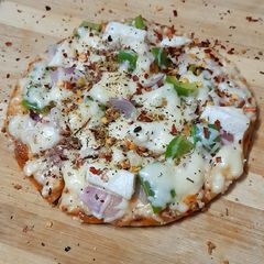A picture of Chessy whole wheat pan pizza.