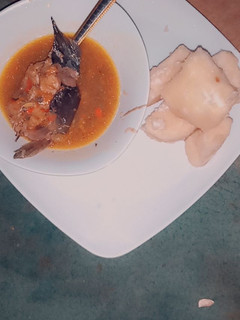 A picture of Boiled yam with catfish pepper soup.