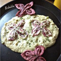 A picture of Floating Beetroot Flowers in White Gravy.