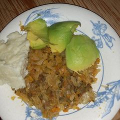 A picture of MixedBeef&cabbage and ugali with Avocado.