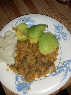 A picture of MixedBeef&cabbage and ugali with Avocado.