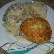 Papas rellenas con salsa de champiñones
