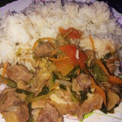 A picture of Beef stew with boiled rice.