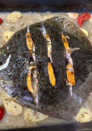 Una foto de Rodaballo al vino