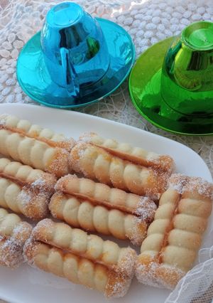صورة لوصفة حلوة الضفيرة بالمول 🧇 وبنة رووووعة 😋☕