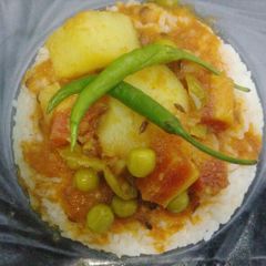 Tomato curry with rice A picture of Tomato curry with rice.