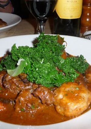 A picture of Beef Stew and Dumplings.