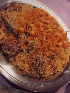 صورة لوصفة الرز البخاري باللحم على أصوله