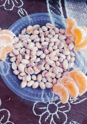عکسی از دستور پسته برشته با تزئین نارنگی 😍😍