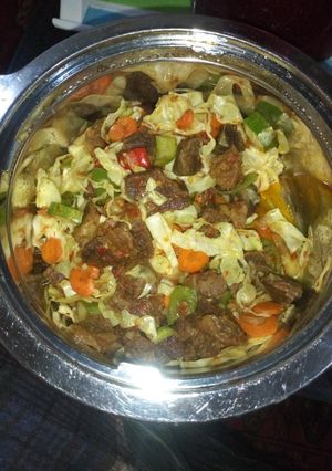 A picture of Vegetable salad with meat.