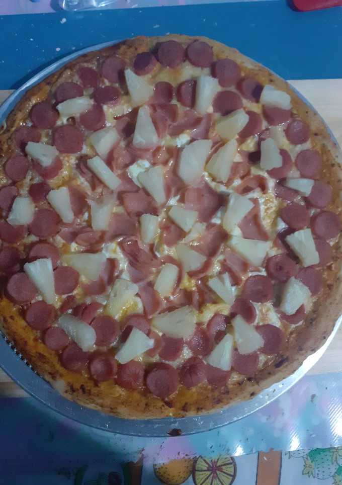 Una foto de Pizza dos quesos hawaianesca