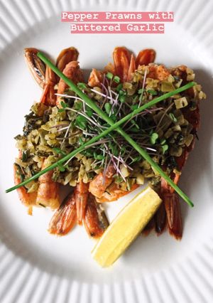 A picture of Pepper Prawns with Buttered Garlic.