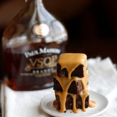A picture of Fudgy Brownies with Salted Caramel Brandy Glaze.