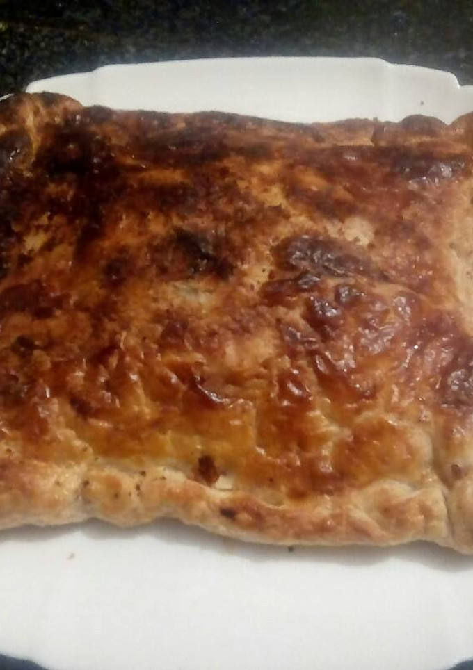 Una foto de Hojaldre relleno estilo pizza