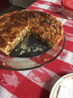 Una foto de Quiche de cebollas