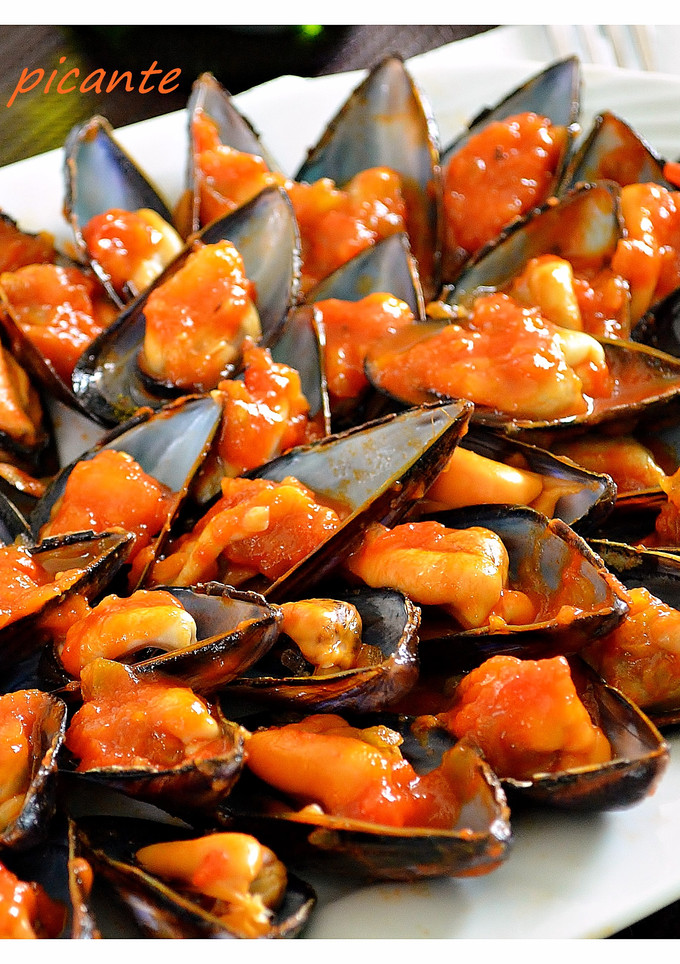 Una foto de Mejillones en salsa picante