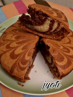 A picture of Eggless Marble Cake.