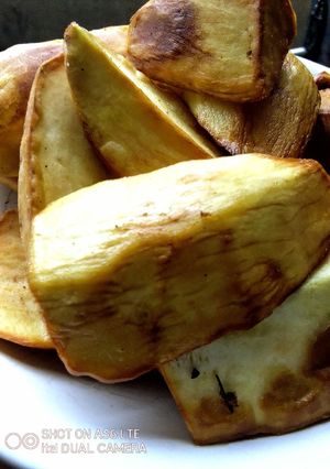 A picture of Ginger Flavoured Sweet Potatoes Wedges.