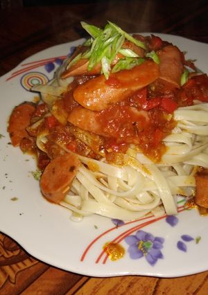Una foto de Salchichas en salsa de tomate y coca - cola