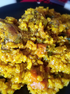 Una foto de Arroz con codornices