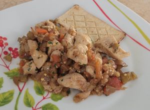 Una foto de Pollo con berenjena
