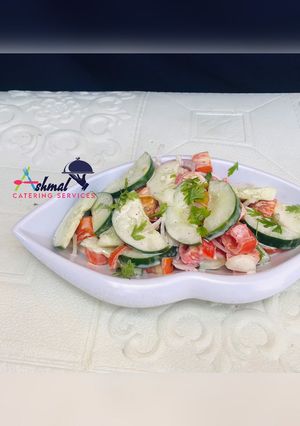 A picture of CREAMY TOMATO & CUCUMBER SALAD.
