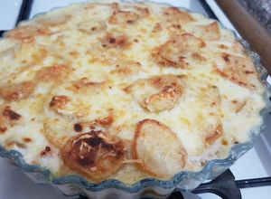 Une photo de Gratin pomme de terre aubergine et courgette