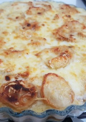 Une photo de Gratin pomme de terre aubergine et courgette