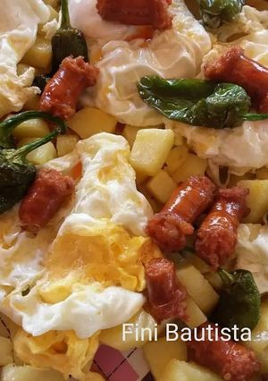 Una foto de Huevos con patatas