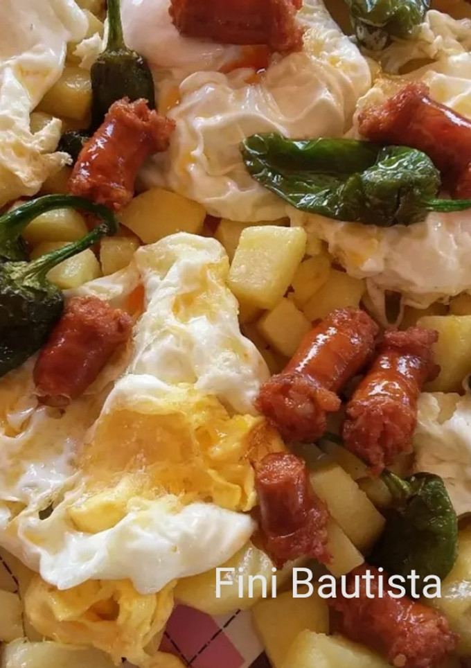 Una foto de Huevos con patatas