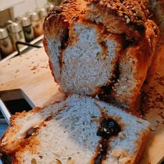 A picture of Bread with olive thyme.
