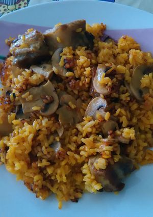 Una foto de Arroz con costilla y champiñón de la mía mamma