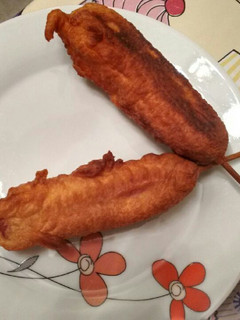 Una foto de Corndogs o Salchichas rebozadas