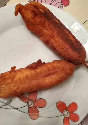 Una foto de Corndogs o Salchichas rebozadas